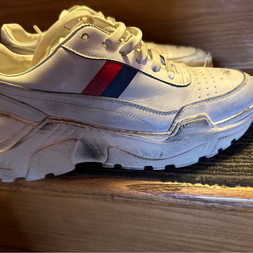 Joshua’s Distressed sneakers. 8